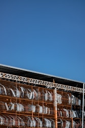 Display of new and used auto parts arranged on shelves.