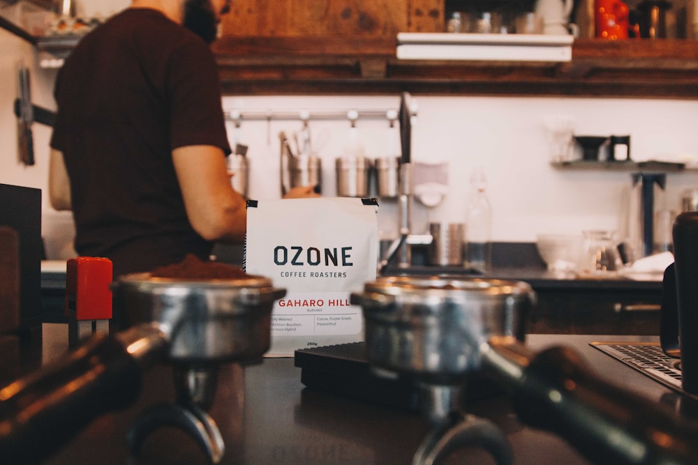 man standing near kitchen table