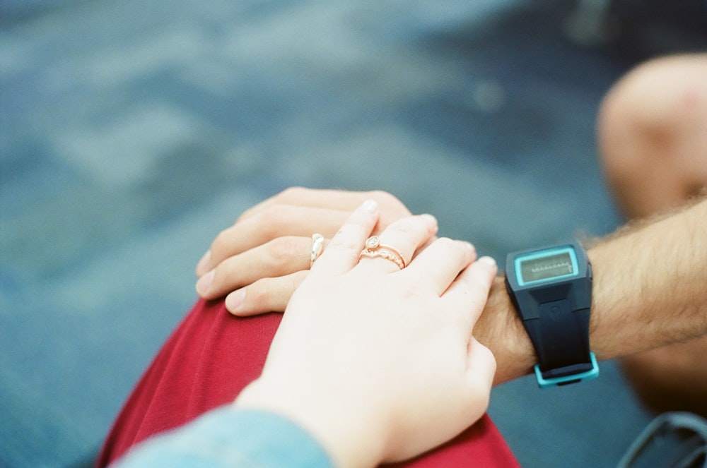 two person holding hands