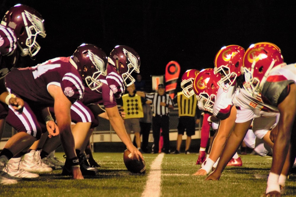 closeup photo of football players