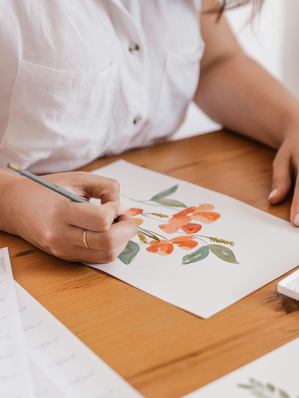 woman holding paint brush