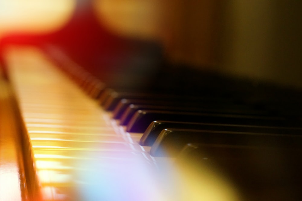 selective-focus photography of piano