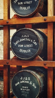 brown wooden barrel rack