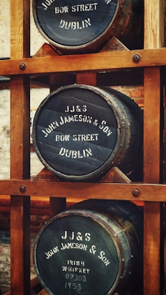 brown wooden barrel rack