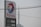 A tall sign for Total with the company's logo and current petrol and diesel prices. The backdrop includes an overcast sky and visible power lines overhead.