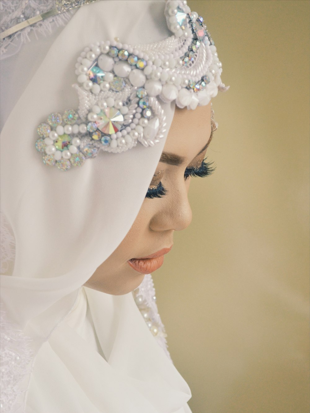 woman wearing white abaya wedding dress