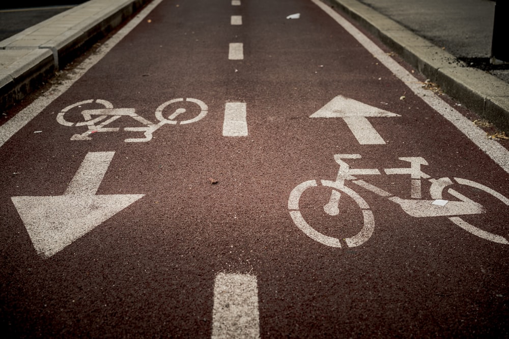 bicycle lane sign on road