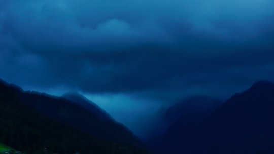 grey clouds under mountain in Schladming Austria