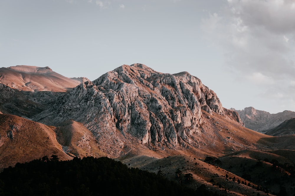 aerial photography of brown and gray mountain ranges