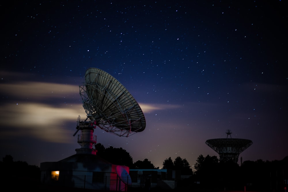 white satellite dishes