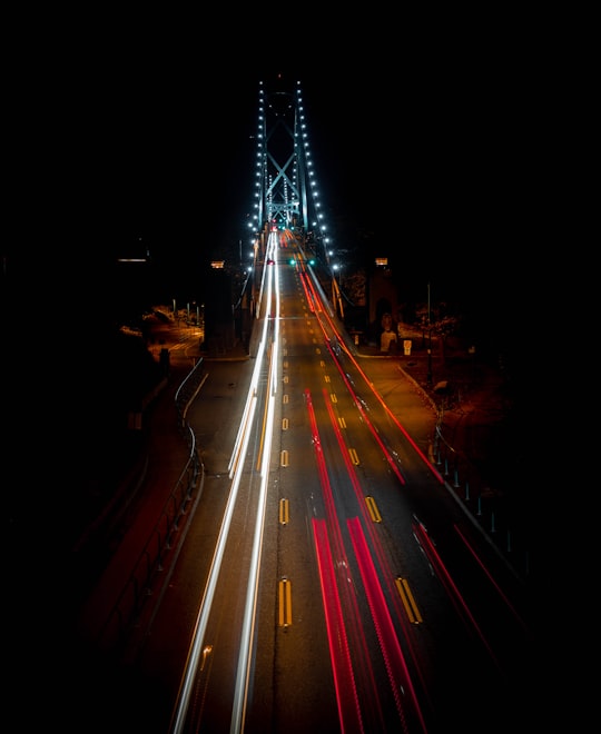 time lapse photography of wide road in Stanley Park Canada