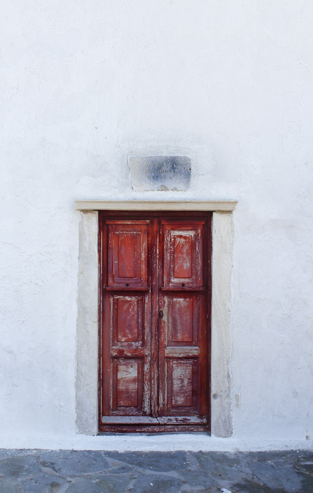 red wooden 6-panel door