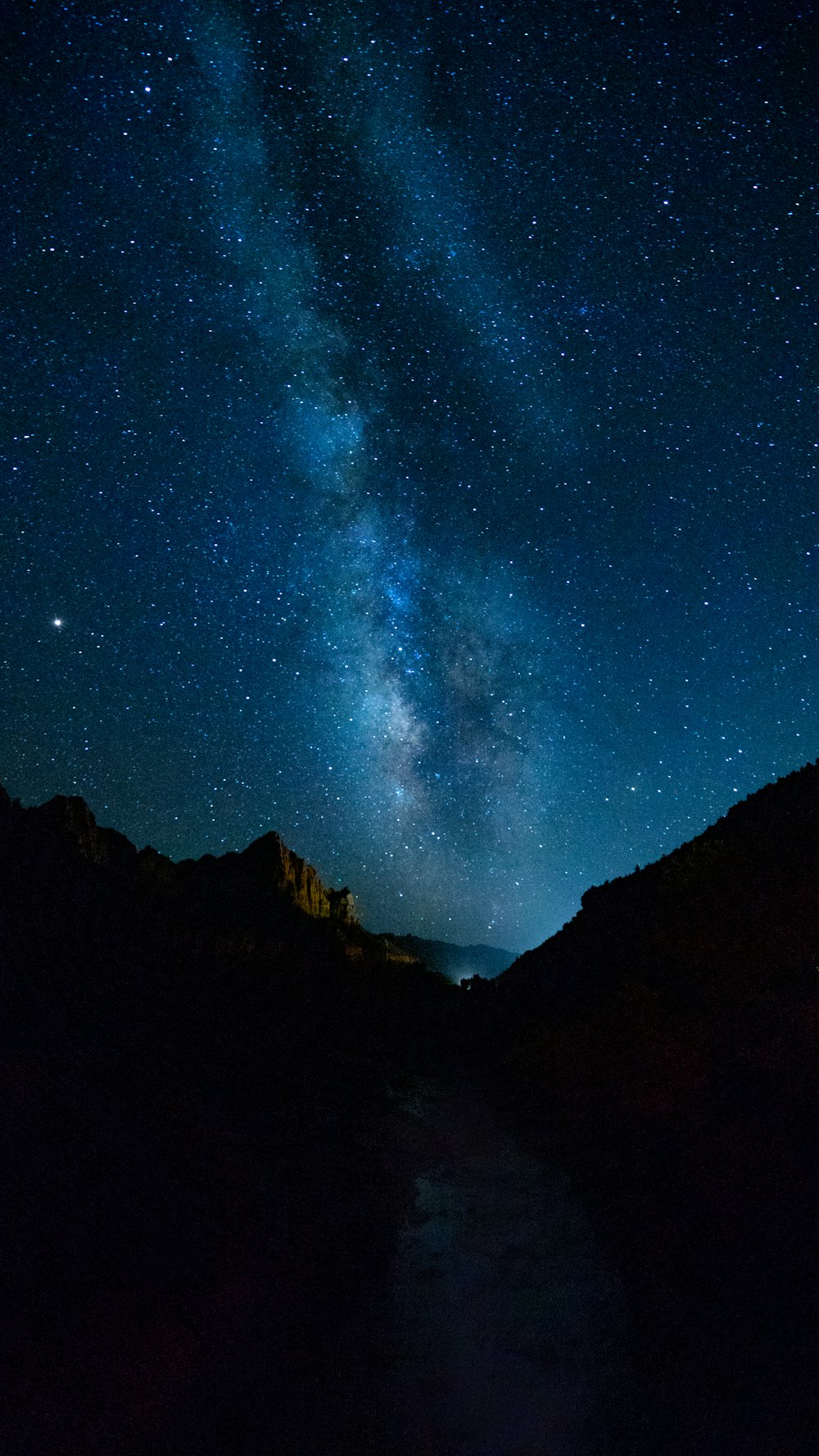 silhouette photography of mountain under sky