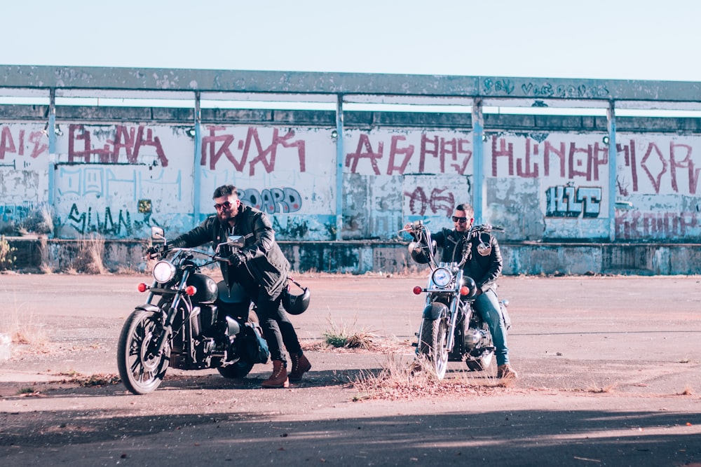 two person riding motorcycles