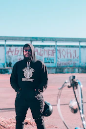 Cozy hoodies with vibrant, historical Catalan street art patterns.