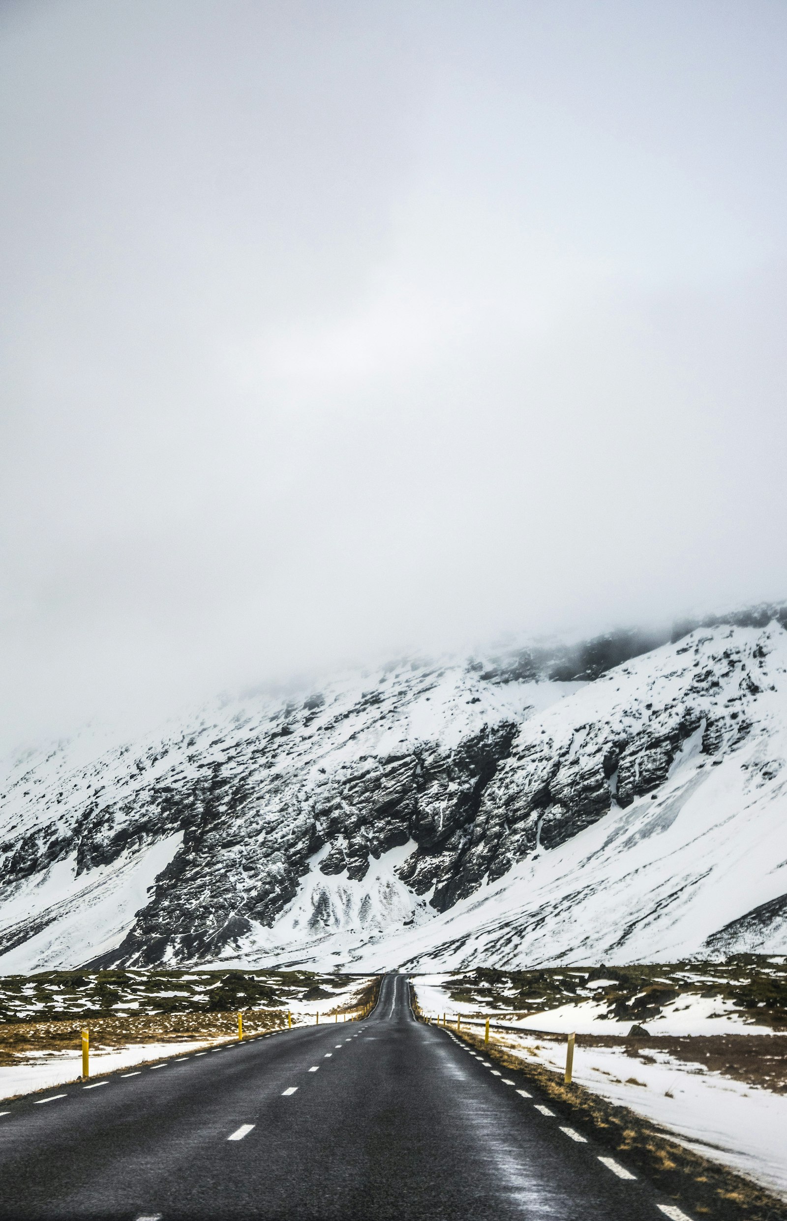 Nikon D5300 + Nikon AF-S DX Nikkor 18-105mm F3.5-5.6G ED VR sample photo. Empty road beside snow photography