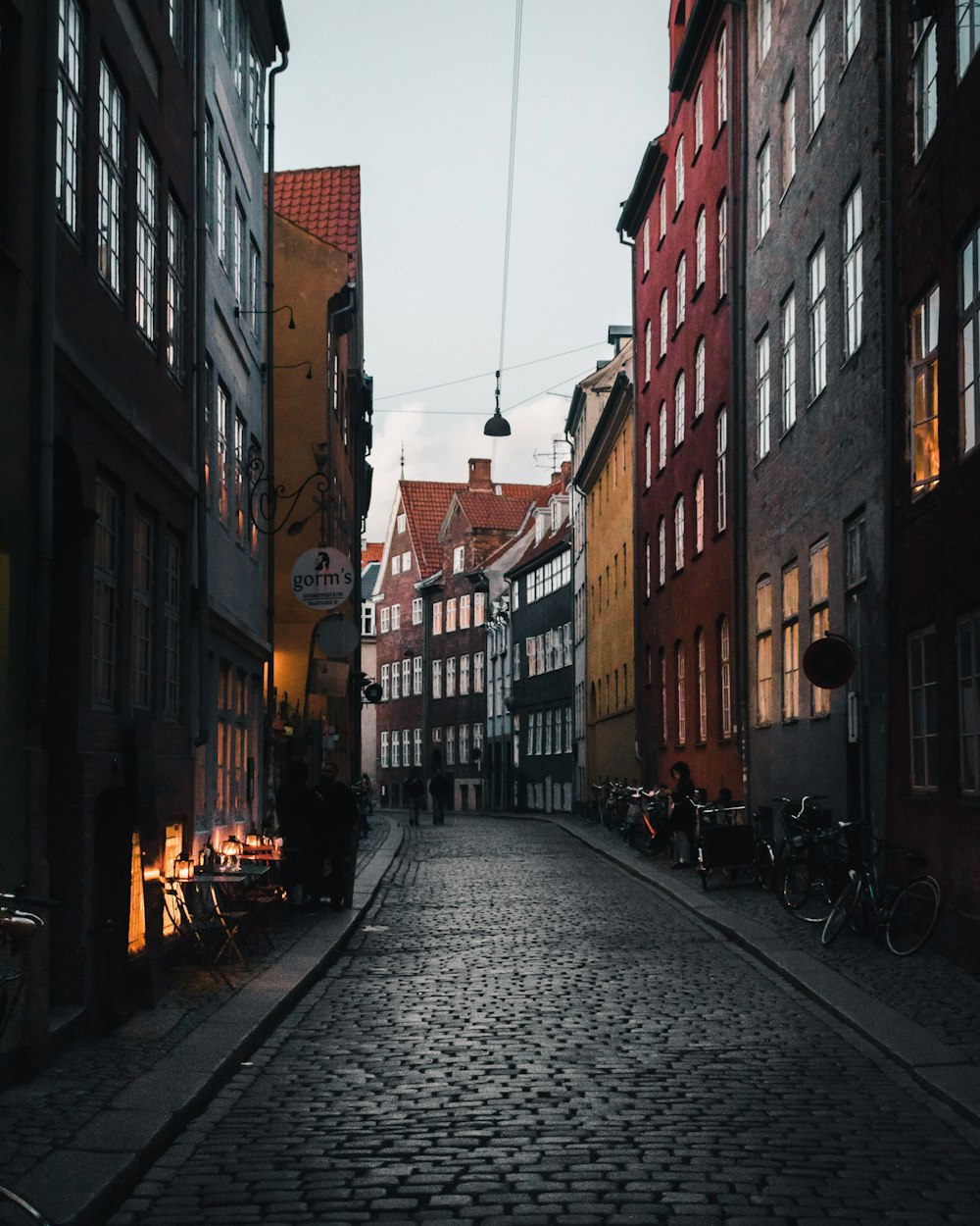 paved road surrounded by buildings at daytime