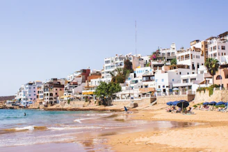 white building near sea during daytime