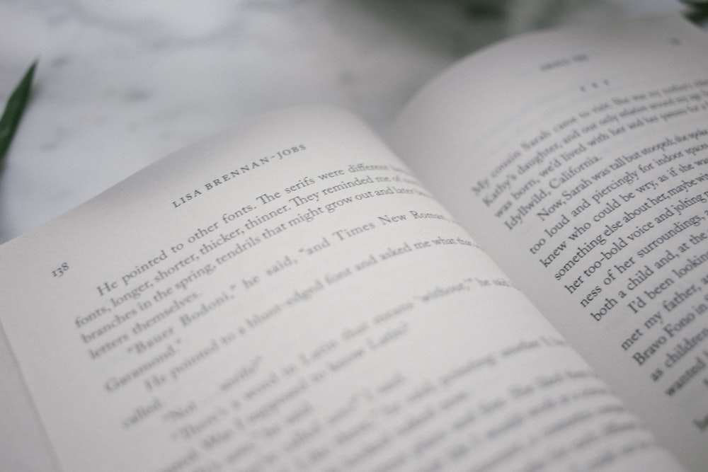 selective focus photography of book page