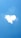 A cloud shaped like a heart against a bright blue sky.