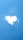 A cloud shaped like a heart against a bright blue sky.