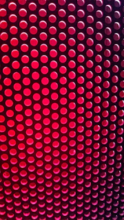 A series of red circular marks left on the skin after a cupping treatment.