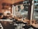 A cozy coffee shop interior with comfortable seating and a warm ambiance.