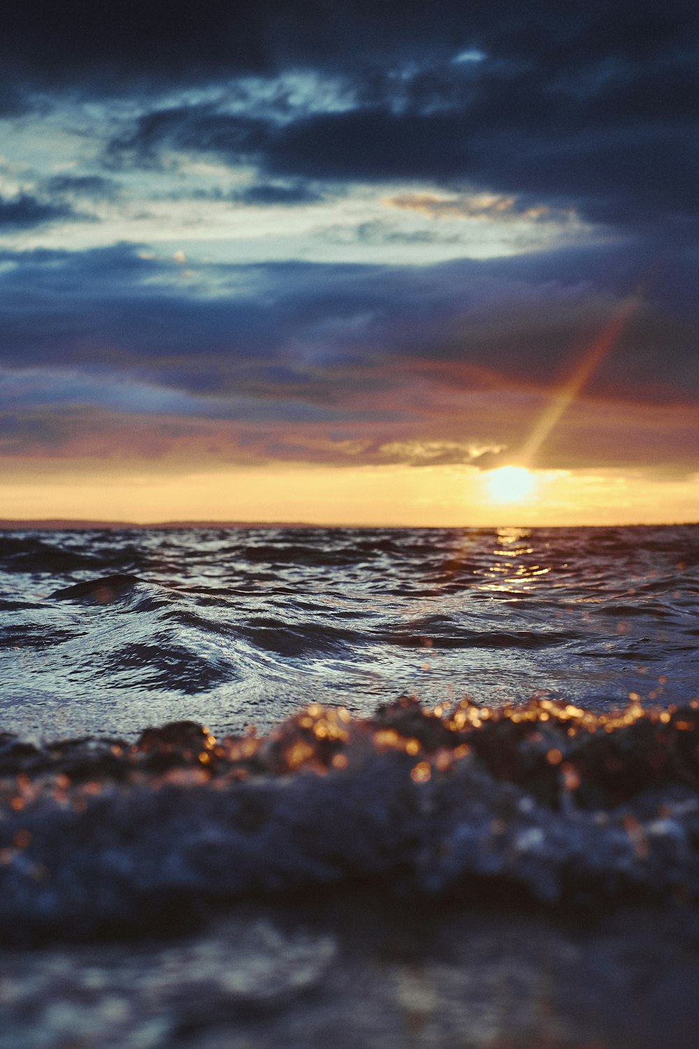 body of water during sunrise