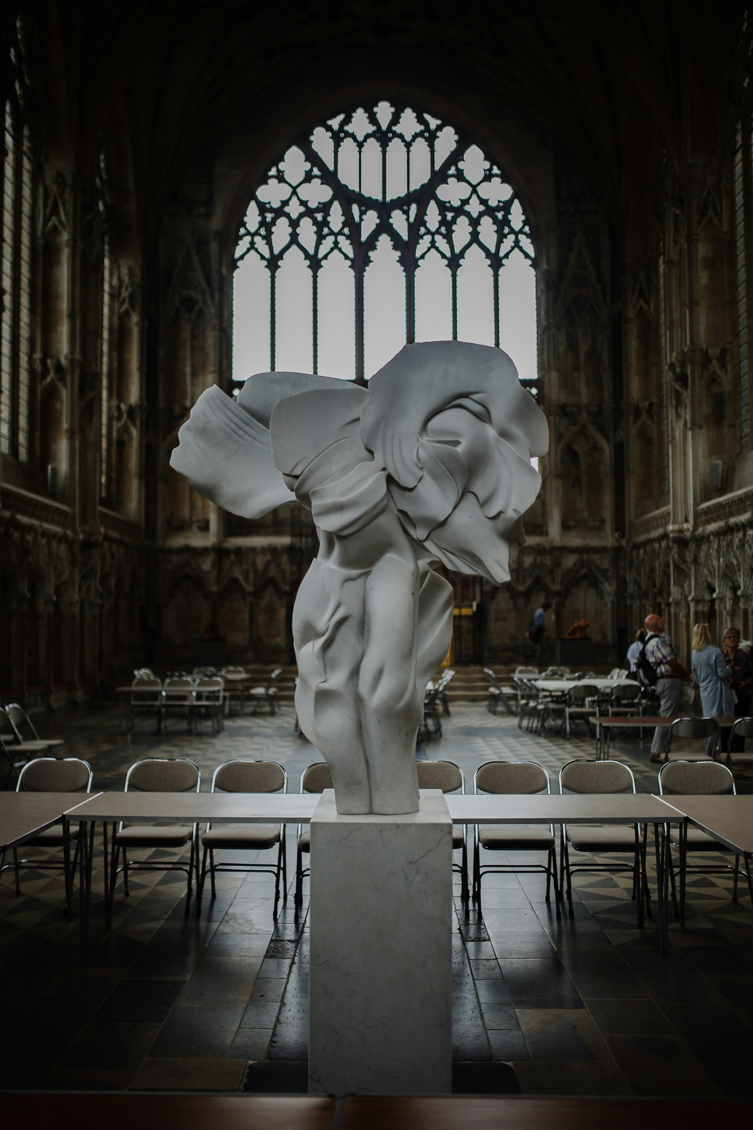 white concrete statue in room