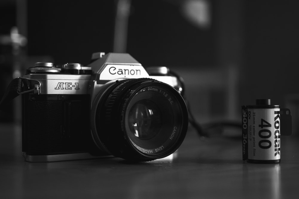 grayscale photo of Canon camera