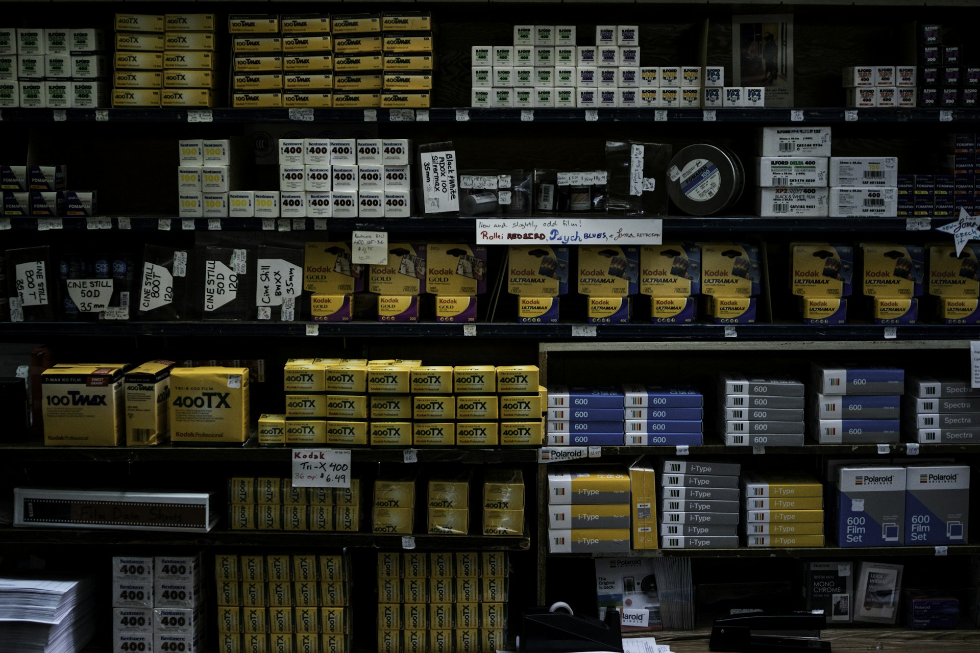 assorted-labeled pack lot in shelf