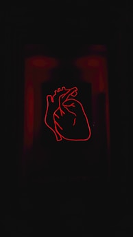 Hands holding a glowing digital heart symbolizing transparent and continuous fundraising