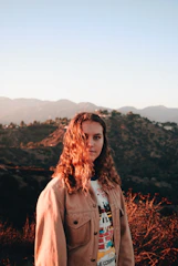 A warm portrait of a passionate candidate standing in front of Curry County's scenic coastline.