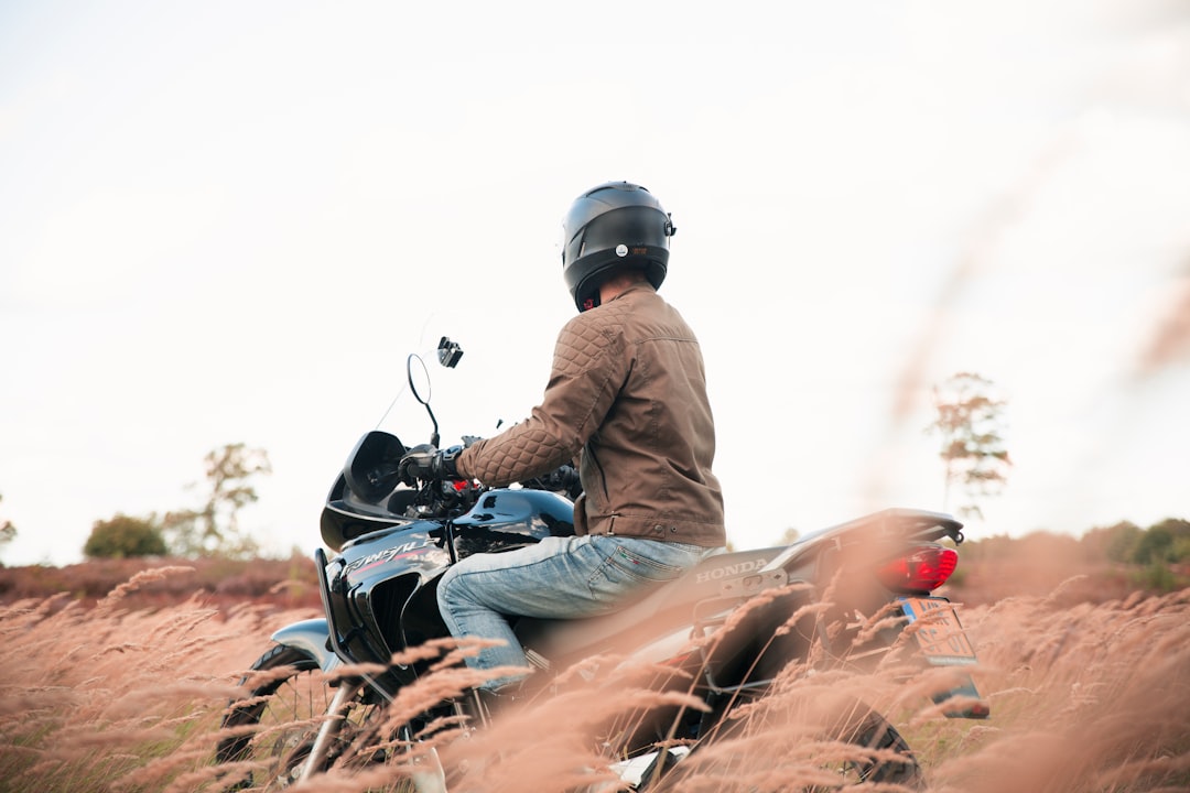 man riding motorcycle