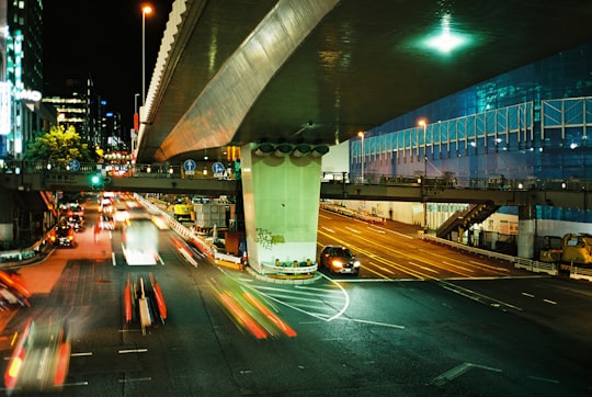 time-lapse photography of vehicles on road in Shibuya Japan