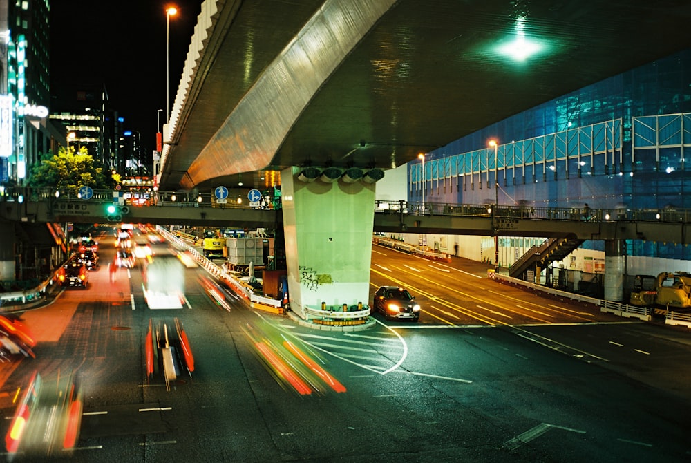 time-lapse photography of vehicles on road