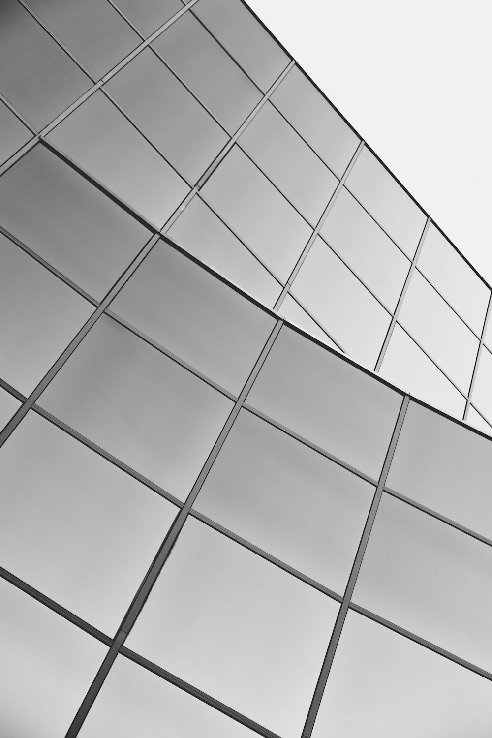 a black and white photo of a tall building