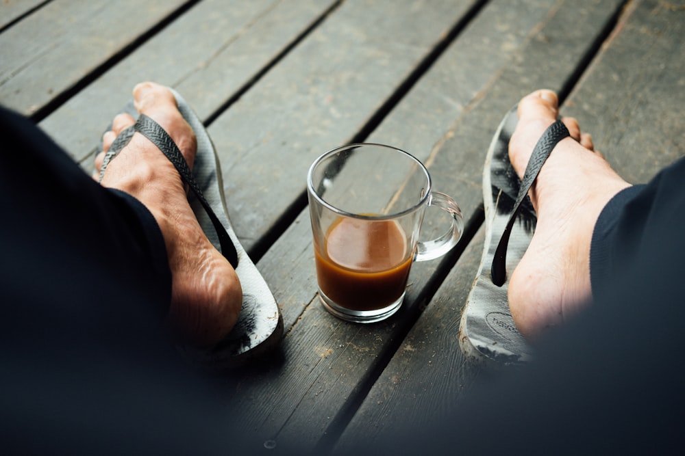 clear glass mug with coffee