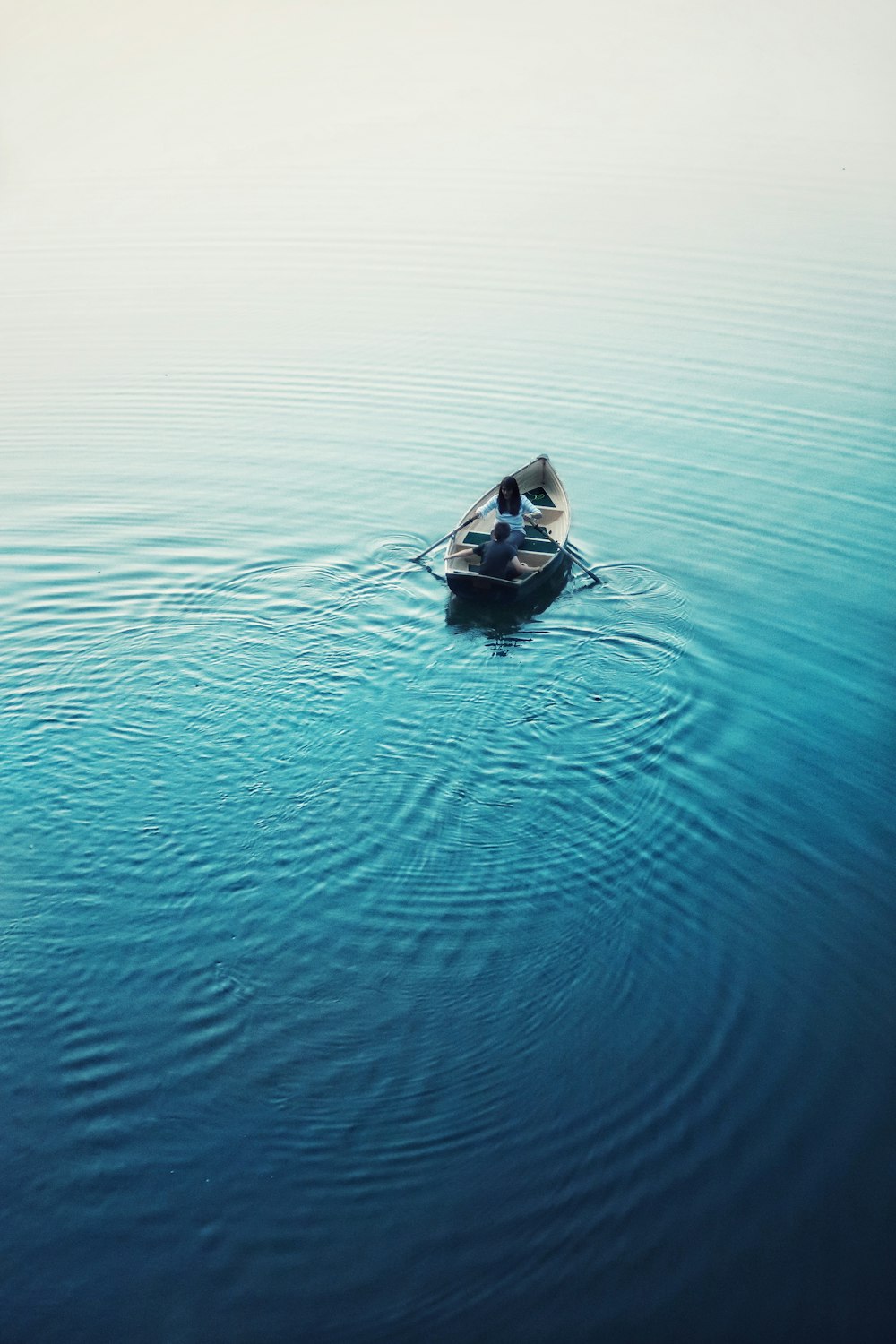 person in boat at daytime
