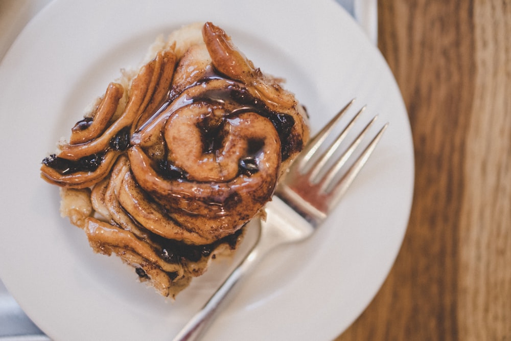 flat-lay photography of bread on white plate