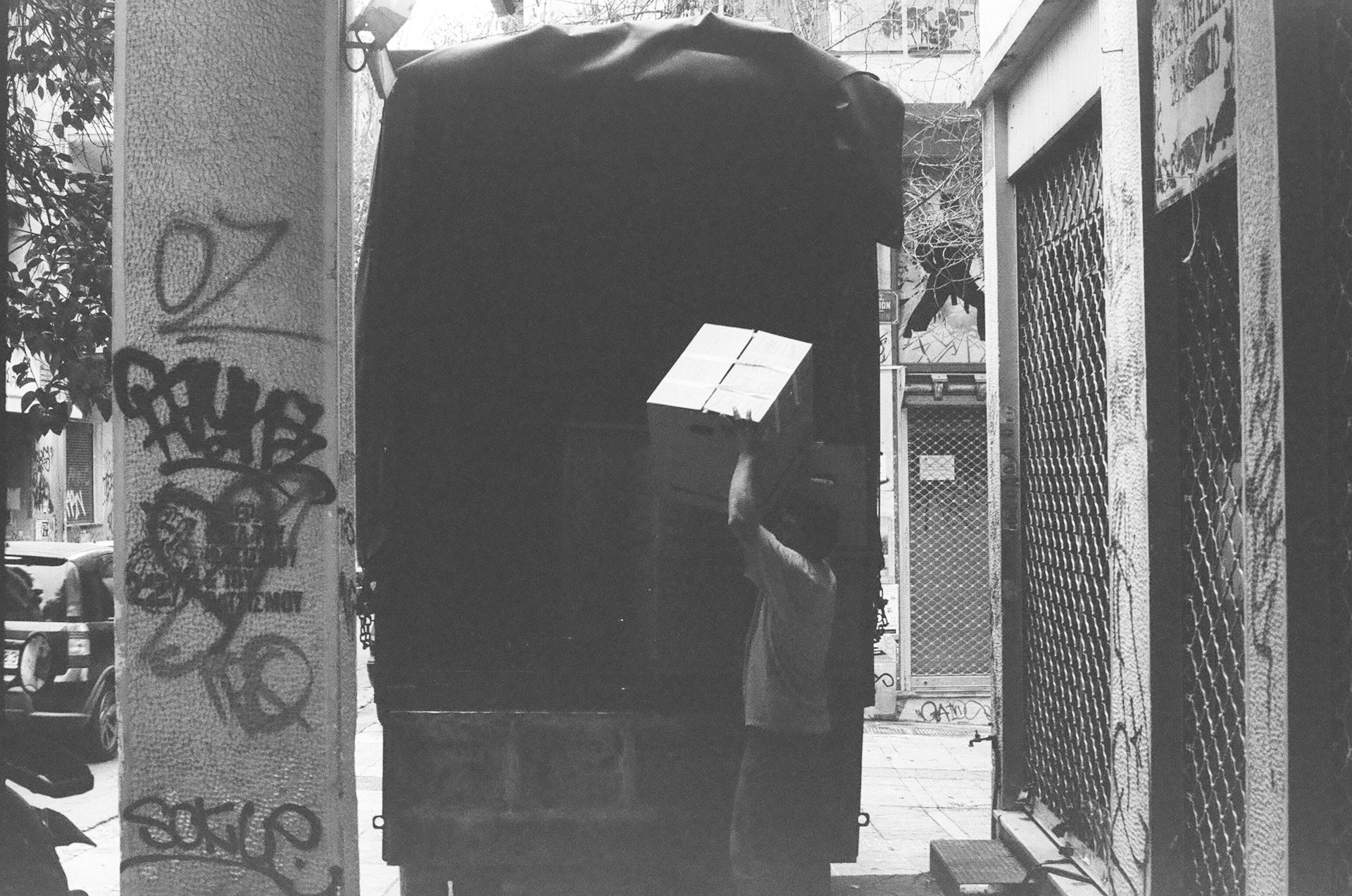 black and brown leather padded tub sofa