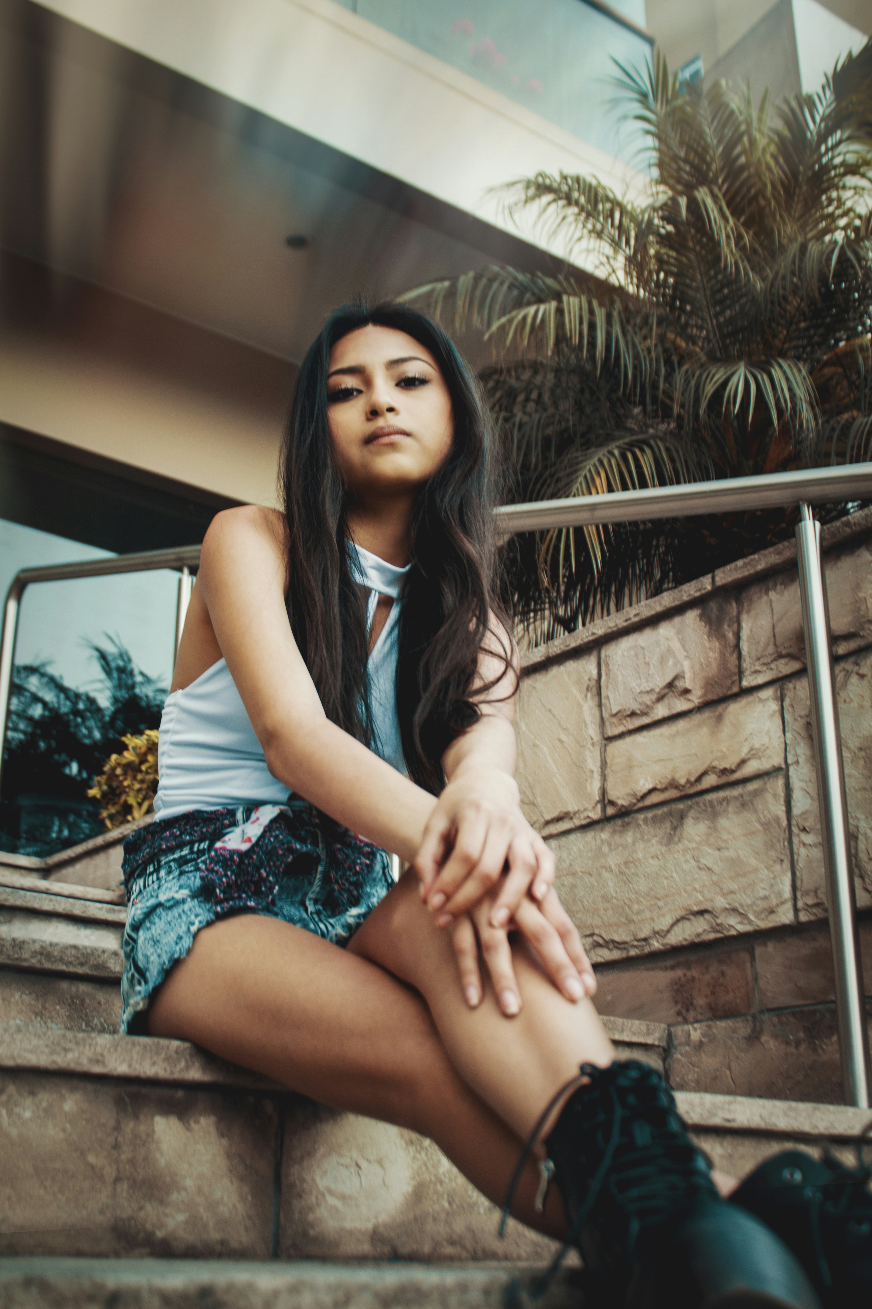 woman sitting on staircase