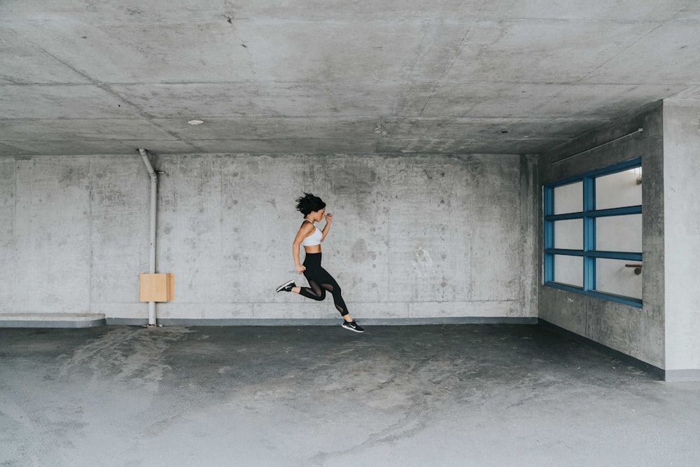 jumping woman inside building
