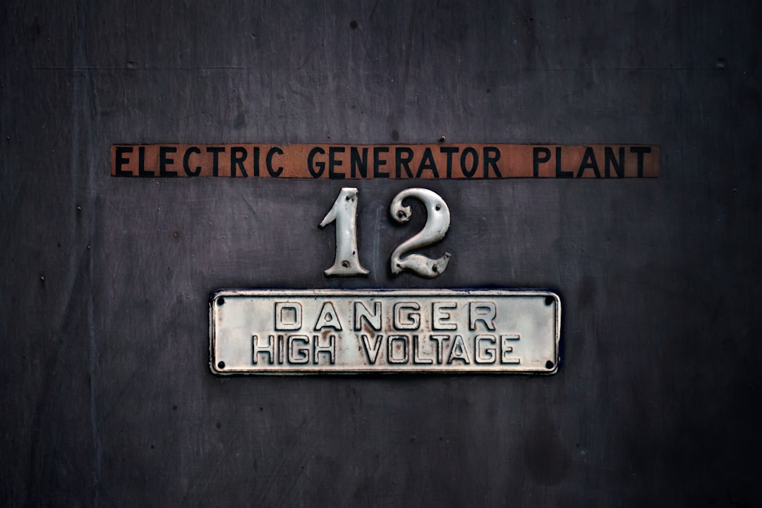 brown and white electric generator plant wall sign