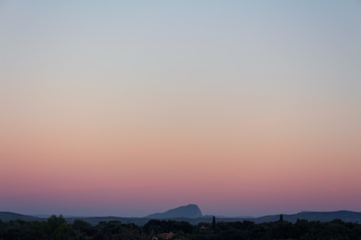 A serene pastel landscape symbolizing transformation and hope.