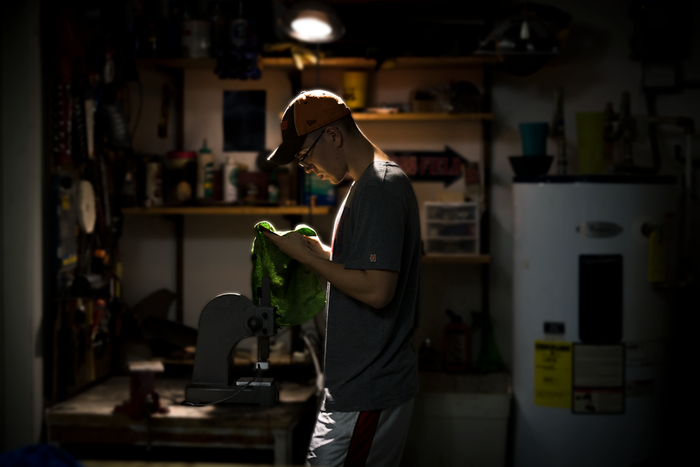 man standing near refrigerator