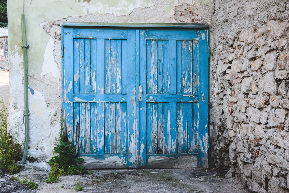 blue wooden panel doors closed