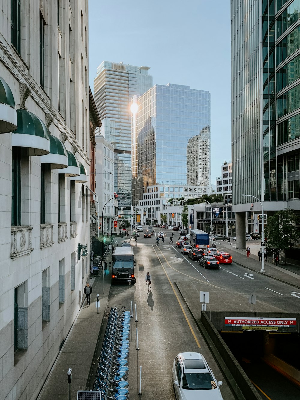 vehicles on road near buildings