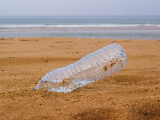 clear bottled water on beach in Taghazout Morocco