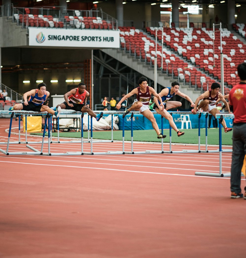 group of huddlers racing on track field